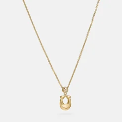 Jewellery|Dr. Martens Coach Women's C Crystal Necklace - Gold/Clear